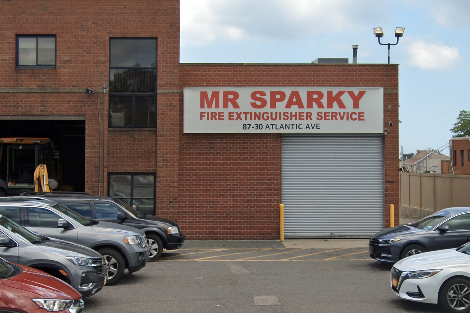 Mr. Sparky Fire Extinguisher Service storefront at 87-30 Atlantic Ave, Jamaica, NY